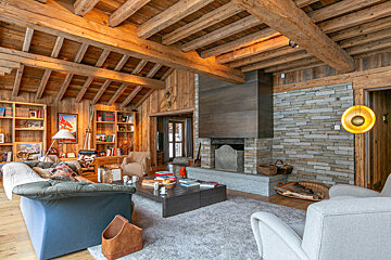 A living room filled with furniture and a fireplace