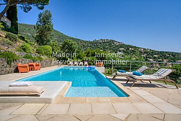 A large swimming pool with the words made in provence written on it