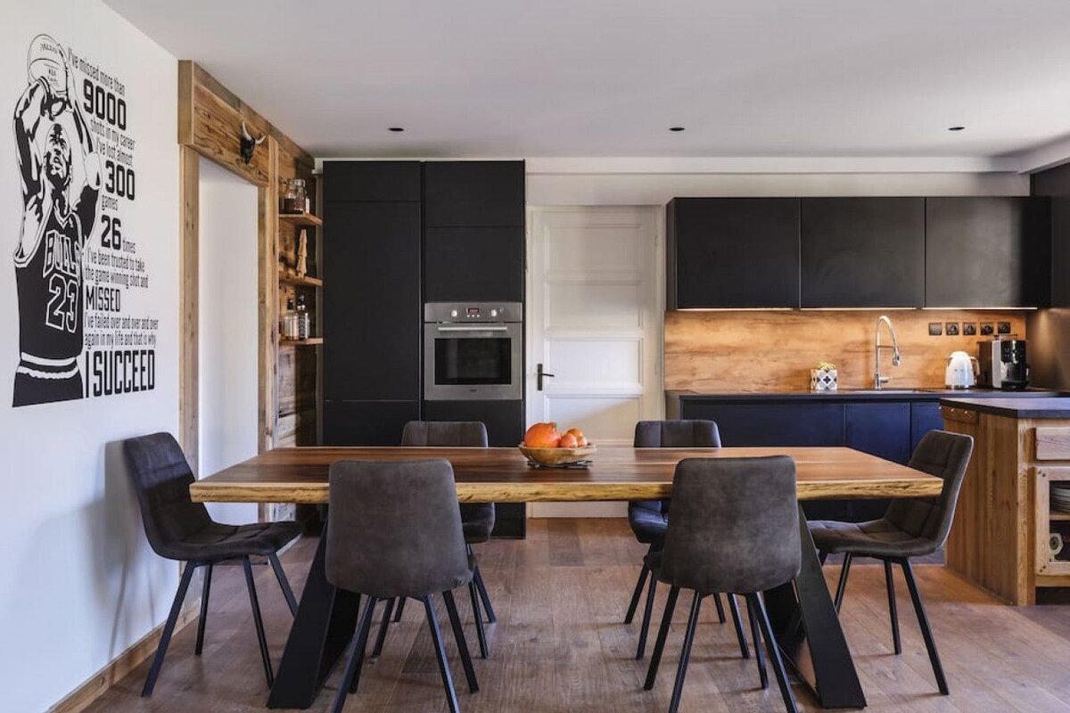 A kitchen with a poster of michael jordan on the wall