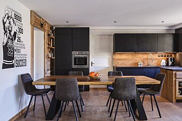 A kitchen with a poster of michael jordan on the wall
