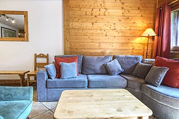 A living room with a couch and a coffee table