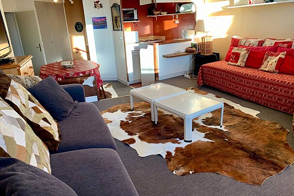 A living room with the number 12 on the wall