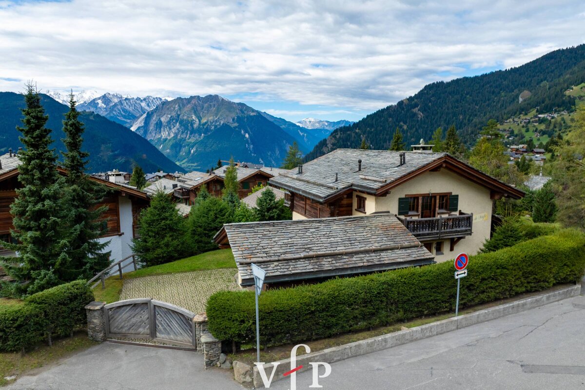 A house with a no parking sign in front of it