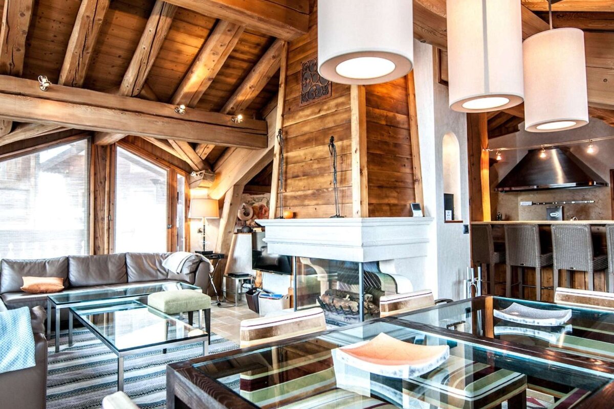 A living room with a fireplace and a couch