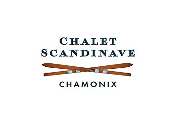 A logo for chalet scandinave chamonix with two crossed skis