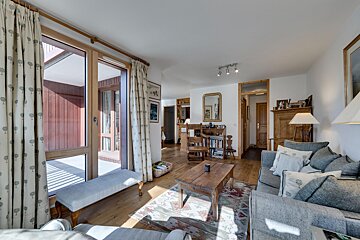 A living room with a couch and a coffee table