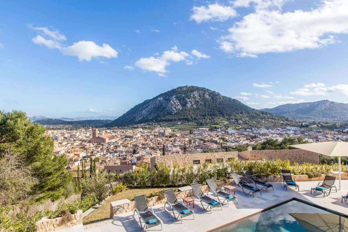 A view of a city with a mountain in the background