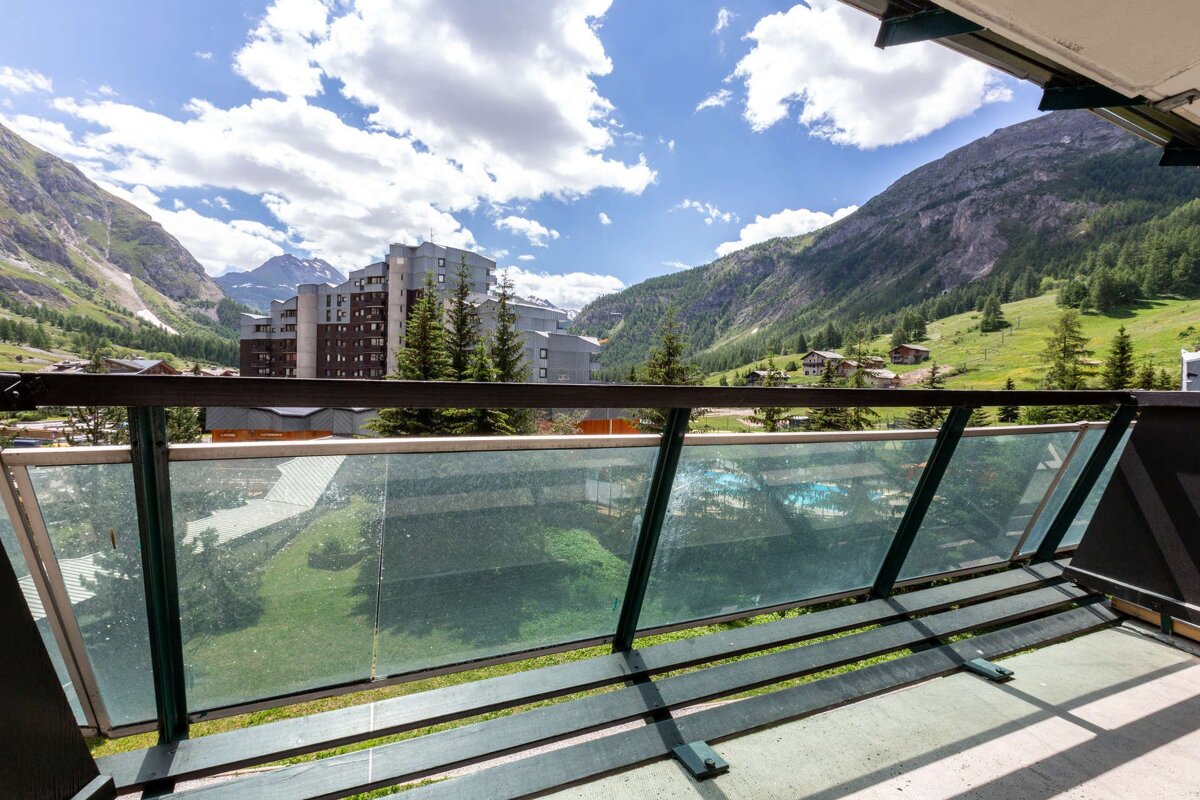 A hallway with a picture of a face on the wall