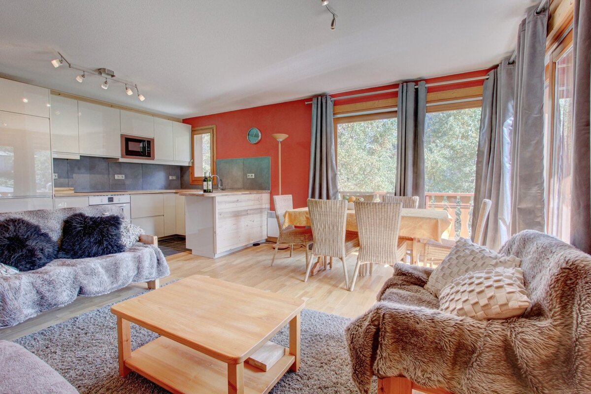 A living room with a couch and a coffee table