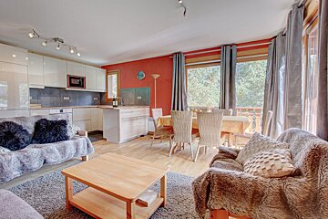 A living room with a couch and a coffee table