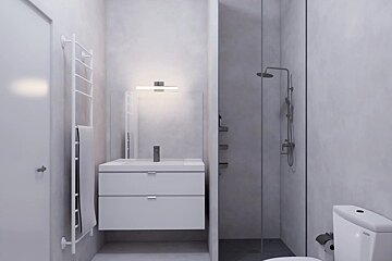 A minimalist, white bathroom with a floating sink vanity, mirror, towel warmer, glass-enclosed shower, and toilet.