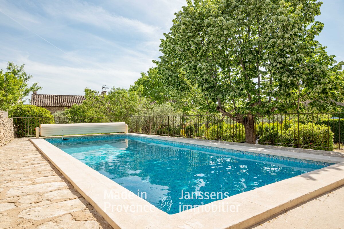 A large swimming pool with the words made in provence on the bottom