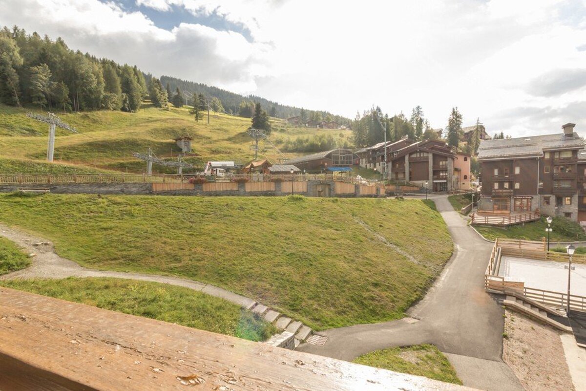 A view of a ski resort from a balcony