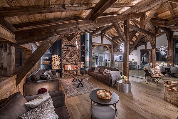 A living room filled with furniture and a fireplace
