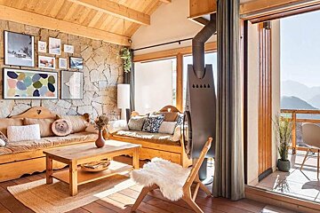 A living room with a couch and a coffee table