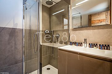 A bathroom with the number 80 on the wall