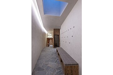 A hallway with a sign that says love and light