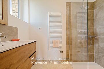 A bathroom with the words made in janssens provence by immobilier