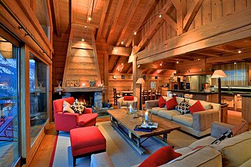 A living room filled with furniture and a fireplace