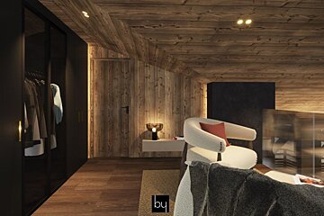 A room with a wooden ceiling and the word by on the bottom
