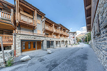 A building with a lot of windows and balconies