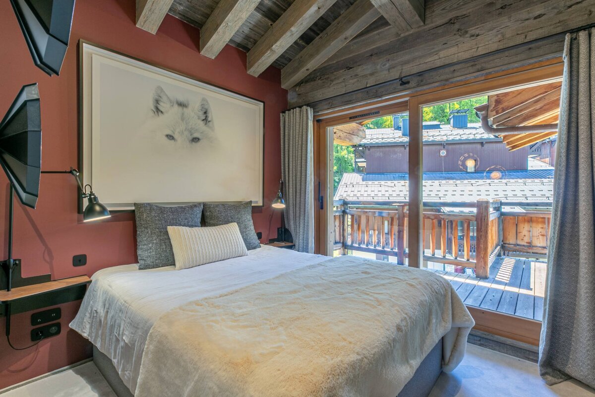 A bathroom with a sink a mirror and a shower