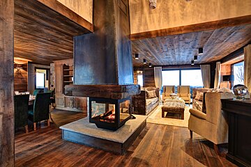 A living room with a fireplace and a couch