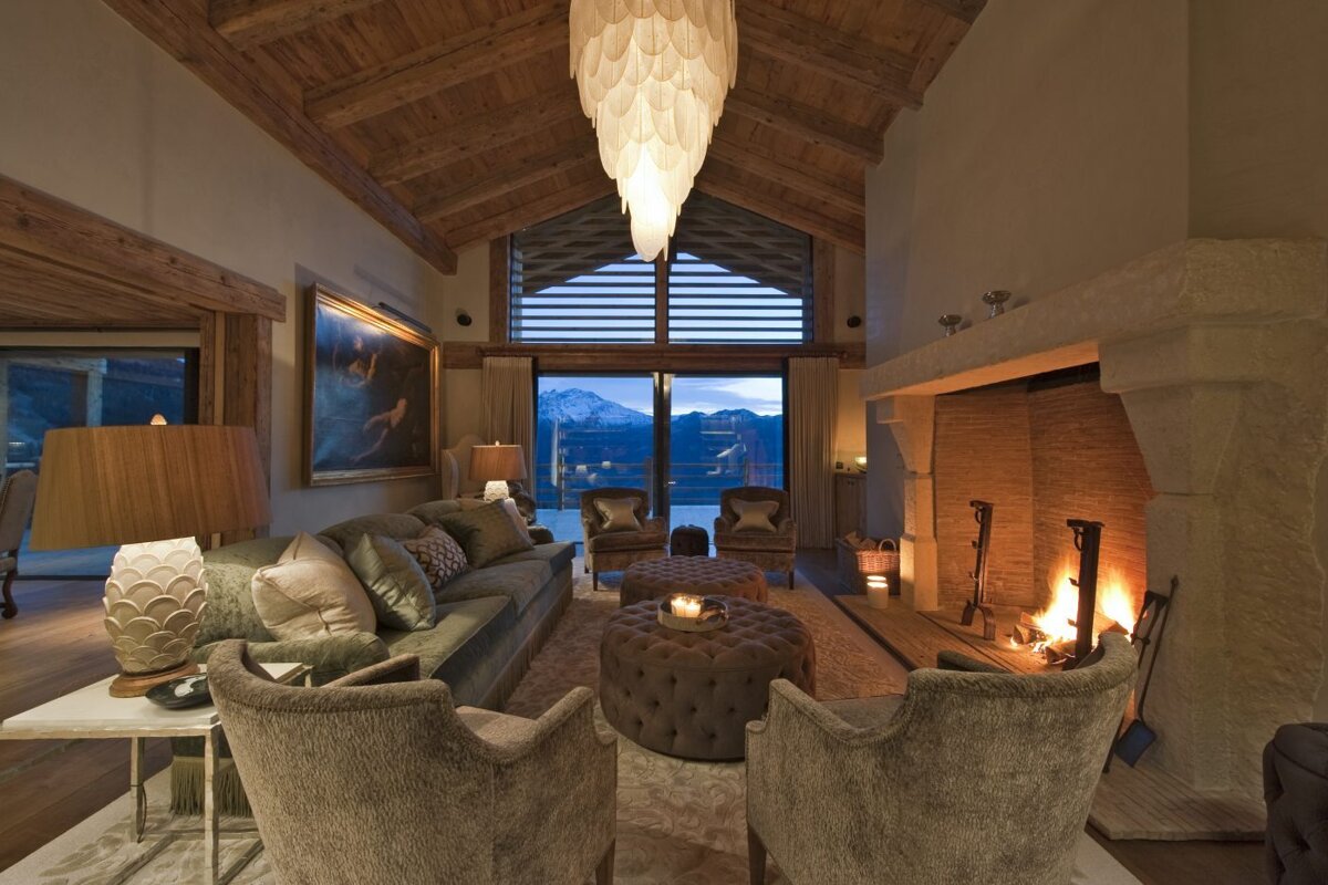 A living room with a fireplace and a couch