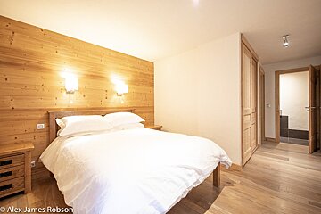 A photo of a bedroom by alex james robson