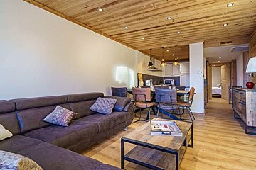 A living room with a couch and a coffee table