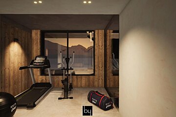 A gym with a treadmill and an exercise bike