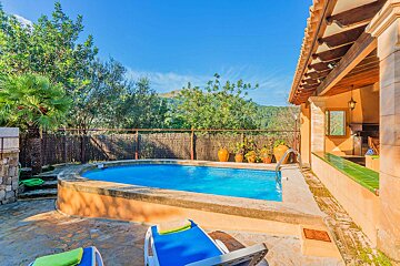 A large swimming pool with a fence around it