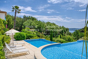 A large swimming pool with the words made in provence on the bottom