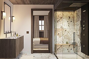 A modern bathroom with a luxurious glass shower, double vanity, and a doorway leading to a cozy bedroom with a large window.