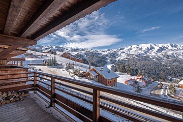A view of a ski resort from a balcony
