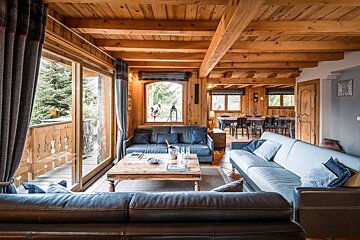 A living room with a couch and a coffee table