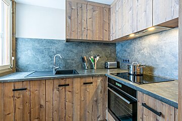 A bathroom with a sink and a toilet