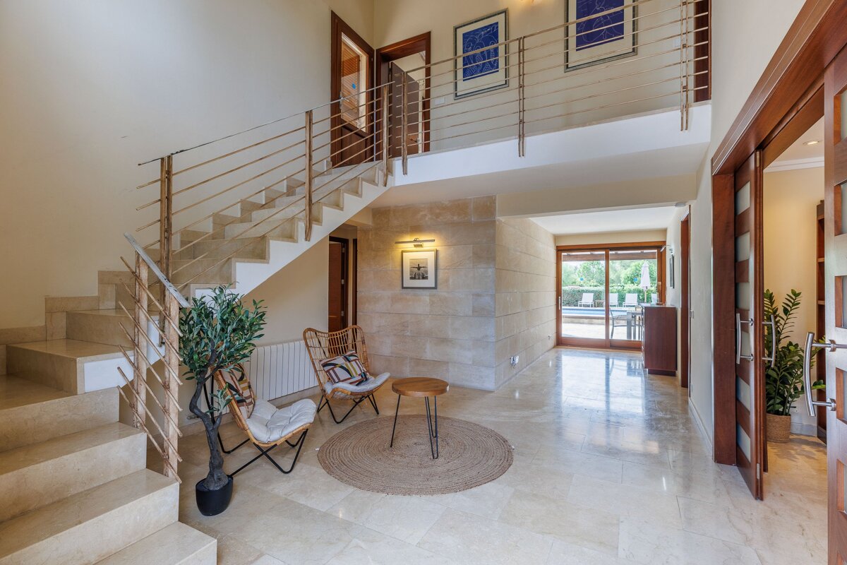 A staircase leading up to the second floor of a house