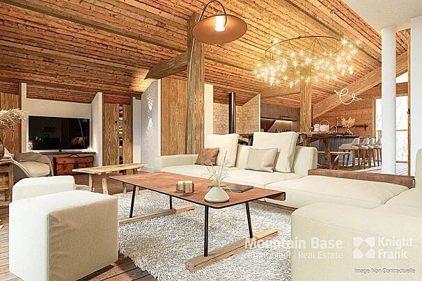 A luxurious, open-plan chalet living room features warm wood-paneled walls/ceiling, a large white sectional, and striking modern chandeliers.