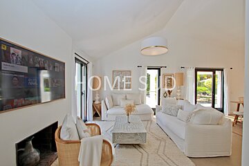 A living room with a flat screen tv that says euro news