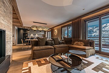 A living room with a couch and a coffee table