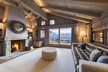 A living room with a fireplace and a couch