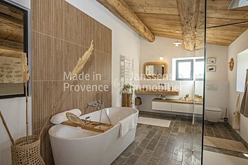 A bathroom with the words made in provence on the wall