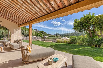 A patio with a roof that says made in provence
