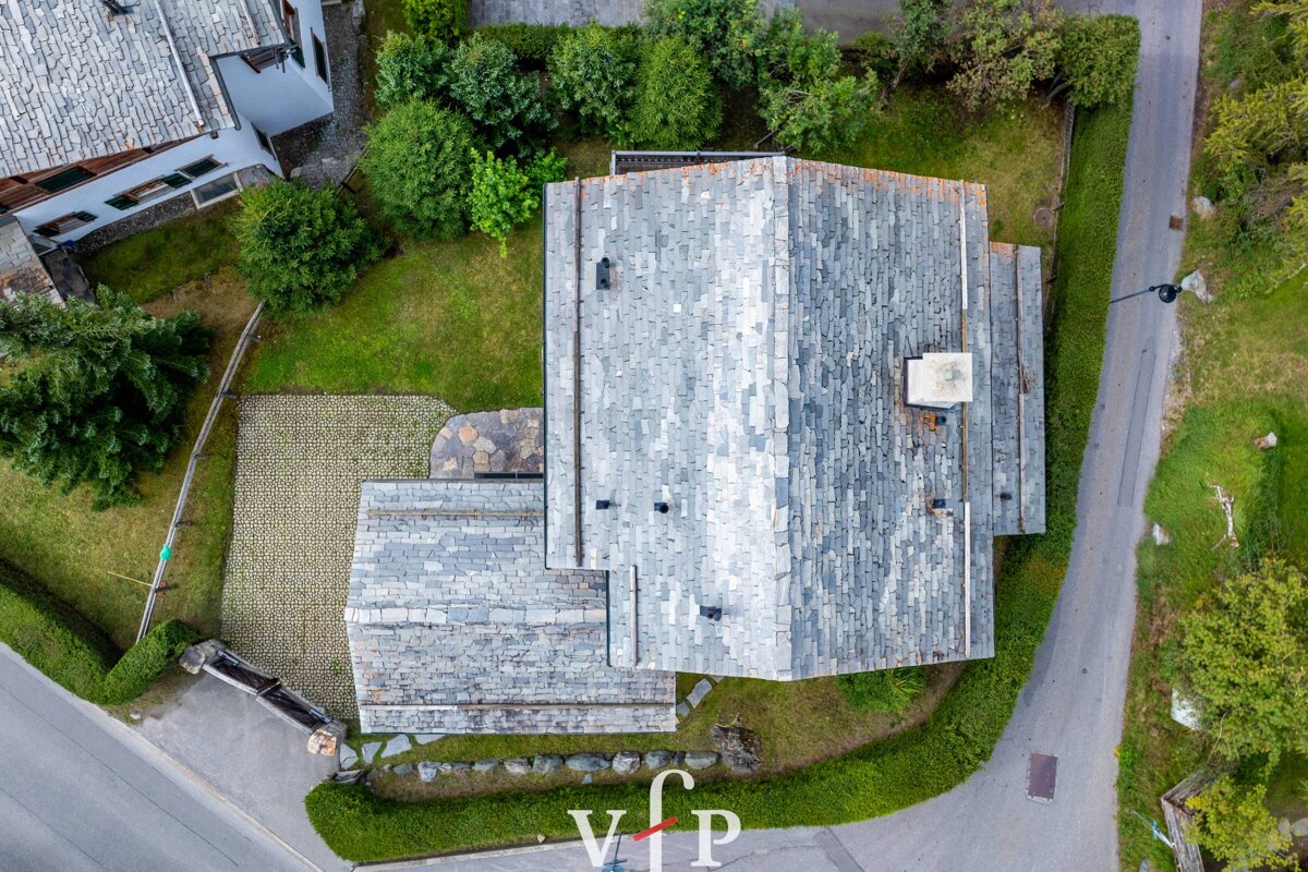 An aerial view of a house with the vip logo visible