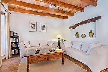 A living room with a couch and a coffee table