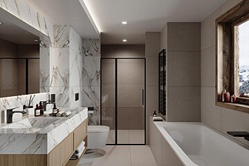 A bathroom with a sink toilet and bathtub
