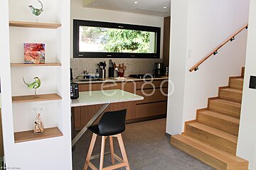 A kitchen with the number 80 on the wall