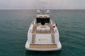 A large white yacht with the name orion 1 on the back