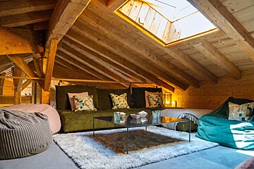 A living room with a couch and a coffee table